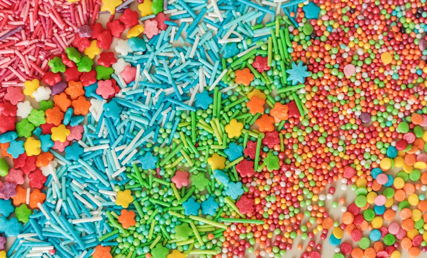 Colourful candy sprinkles and sugar flowers